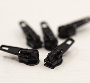 Black Sliders for Standard Continuous Zip, in 2 Sizes. 100 Sliders Per Pack